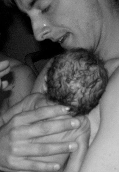 Holding my son, David, for the first time back on October 16th, 2001