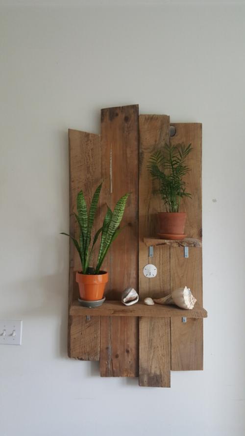 The barn wood accent piece that guests made after being inspired by their stay